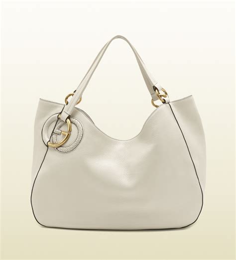 gucci white shoulder bag.